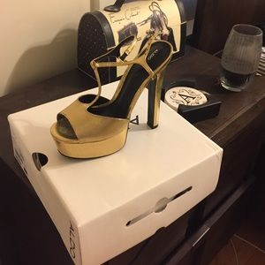 Gold aldo platform heel